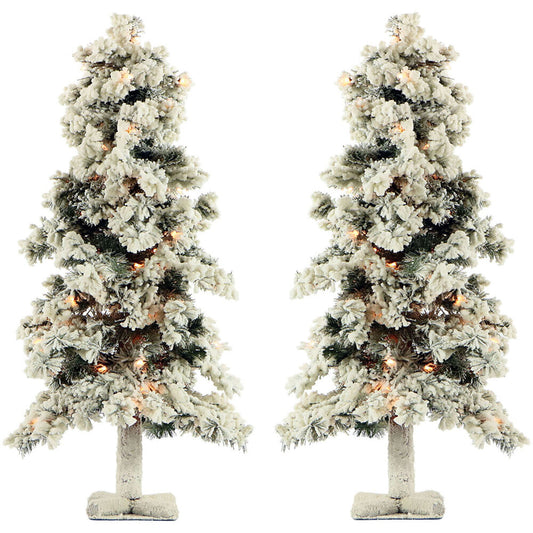 Fraser Hill Farm - 6.0-Ft Snowy Alpine Snow Flocked Christmas Tree with Lifelike Trunk Base and Clear Lights, Set of 2