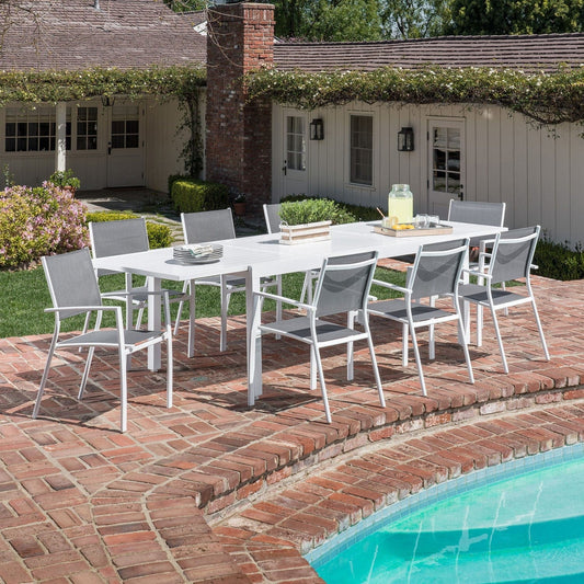 Hanover Outdoor Dining Set Hanover Del Mar 9 Piece Outdoor Dining Set with 8 Sling Chairs in Gray/White and a 40" x 118" Expandable Dining Table | DELDN9PC-WW