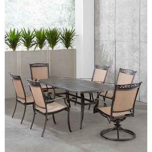 Hanover Outdoor Dining Set Hanover - Fontana 7 Piece Outdoor Dining Set with 2 Sling Swivel Rockers | 4 Sling Chairs, and a 38-In. x 72-In. Cast-Top Table | FNTDN7PCSW2C