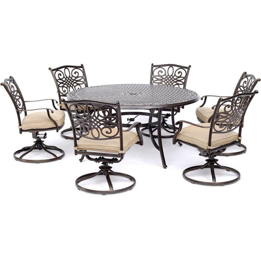 Hanover Outdoor Dining Set Hanover - Traditions 7-Piece Dining Set in Tan with a 60 In. Round Cast-top Table and Six Swivel Rockers - TRADDN7PCSWRD6