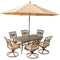 Hanover Patio Furniture Hanover - Traditions 7-Piece Dining Set in Tan with 72 x 38 in. Dining Table, 9 Ft. Table Umbrella, and Umbrella Stand