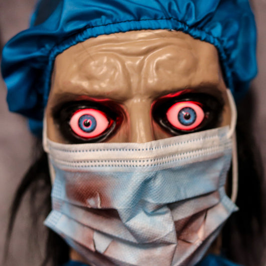 Haunted Hill Farm - 5.5-Ft. Surgeon Marrow Laughing Animatronic, Indoor or Covered Outdoor Halloween Decoration, Red LED Eyes