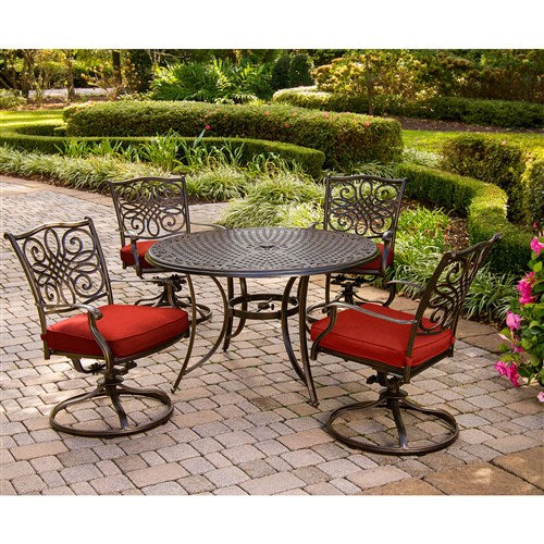 Hanover Traditions 5-Piece Dining Set with Four Swivel Rockers in Red and a 48 In. Cast-top Table
