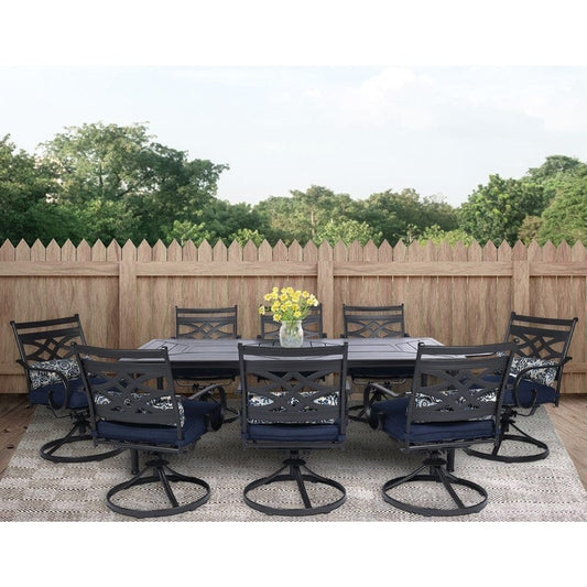 Outdoor Dining Set Hanover MCLRDN9PCSW8-NVY Montclair 9-Piece Dining Set with 8 Swivel Rockers and Table - Navy Blue and Brown