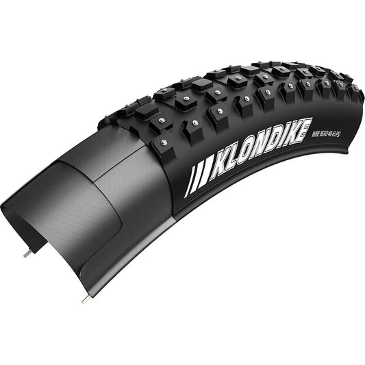 Conquer Winter Adventures with KENDA Liberty Mountain - Klondike 26 X 2.10 Studded Tire from Recreation Outfitters