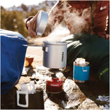 Essential Trail Backpacking Stove Kit with a mesh storage bag