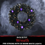 Haunted Hill Farm - 24-In. Spooky Black Tinsel Wreath with Purple Ornaments and Warm White LED Lights, Battery Operated - Black, Purple