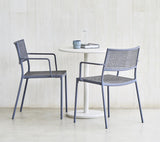 Cane-Line Denmark Outdoor Dining Chairs Cane-Line Less armchair, stackable