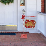 Fraser Hill Farm -  4-Ft. Lamp Post with Merry Christmas Sign and Solar Lantern, Prelit Outdoor (or Indoor) Christmas Decoration