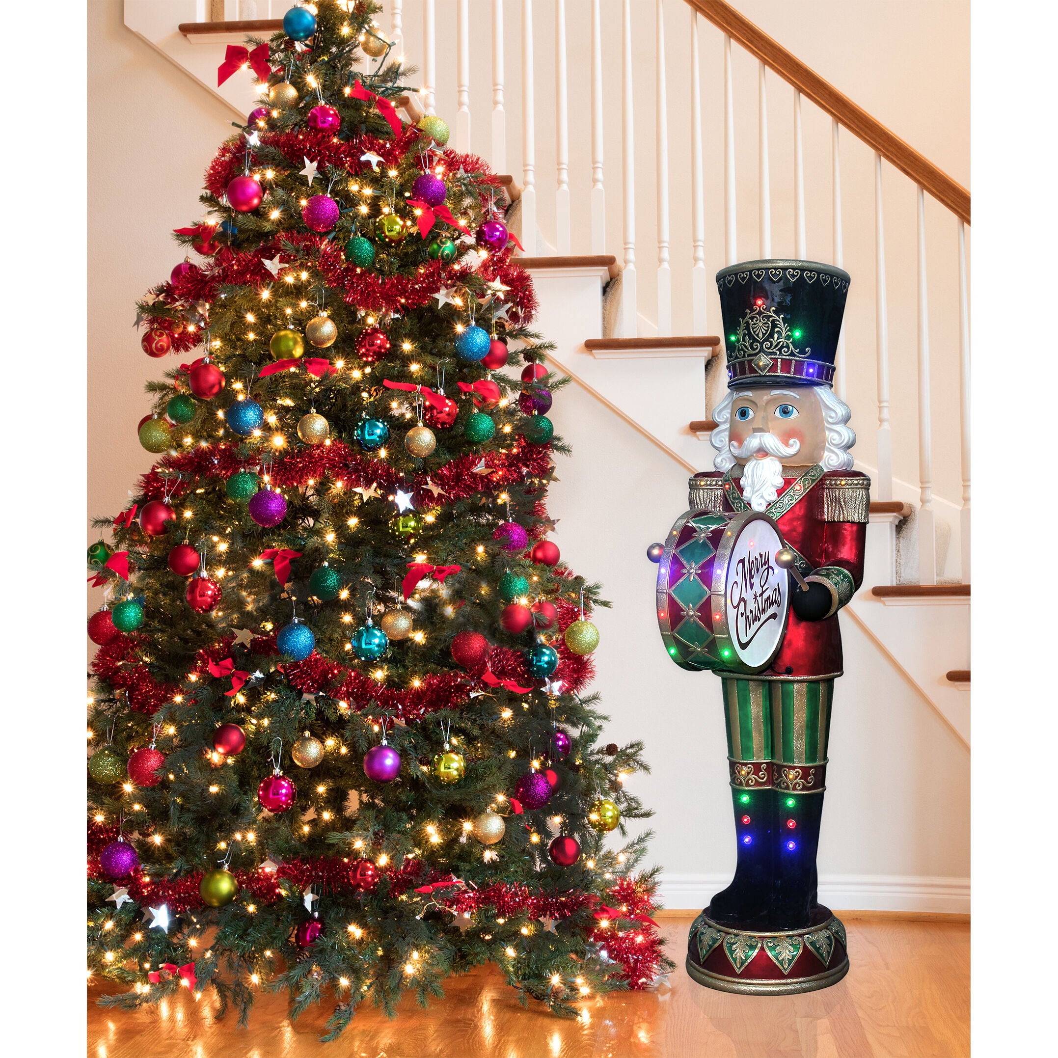 Fraser Hill Farm -  Indoor/Outdoor Oversized Christmas Decor, 6-Ft. Nutcracker Playing Bass Drum w/ Moving Hands, Music, Timer, and 32 LED Lights