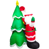 Fraser Hill Farm - 6-Ft. Tall Prelit Mr. and Mrs. Claus with Tree Inflatable with Music