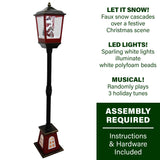 Fraser Hill Farm -  Let It Snow 53-In. Musical Street Lamp w/ Lighted Base, Flying Santa, Cascading Snow, and Christmas Carols, Black/Bronze/Red