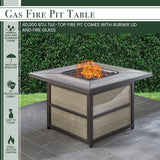 Hanover Fire Pit Chat Set Hanover Fontana 5-Piece Fire Pit Chat Set with 4 Sling Swivel Rockers and a 40,000 BTU Gas Fire Pit Coffee Table | FON5PCSQSW4FP