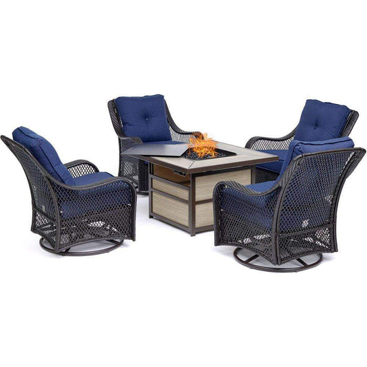 Hanover Fire Pit Chat Set Hanover Orleans 5-Piece Fire Pit Chat Set with a 40,000 BTU Fire Pit Table and 4 Woven Swivel Gliders in Navy Blue