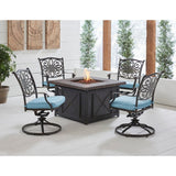 Hanover Fire Pit Chat Set Hanover - Traditions 5-Piece Aluminum Frame Fire Pit Chat Set in Blue with 4 Swivel Rockers and a 40-In. Square Durastone Fire Pit Table | Blue/Bronze  | TRAD5PCDSW4FP-BLU