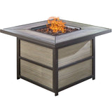 Hanover Fire Pit Chat Set Hanover - Traditions 5-Piece Aluminum Frames Fire Pit Chat Set with 4 Swivel Rockers in Tan with a 40,000 BTU Fire Pit Table | Tan/Tile | TRAD5PCSQSW4FP-TAN