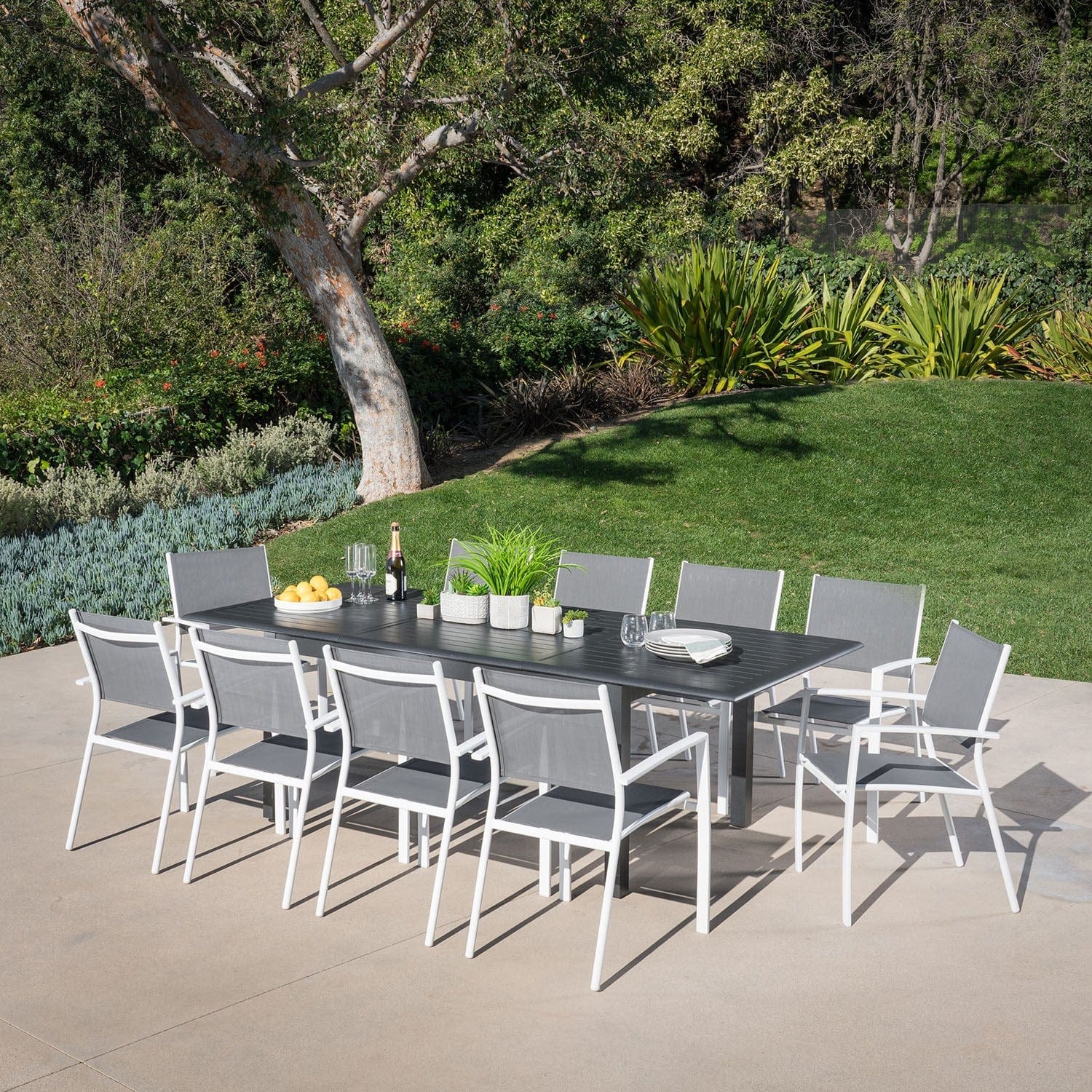 Hanover Outdoor Dining Set Hanover - Cameron 11-Piece Expandable Dining Set with 10 Sling Dining Chairs and a 40" x 94" Table - CAMDN11PC-WHT