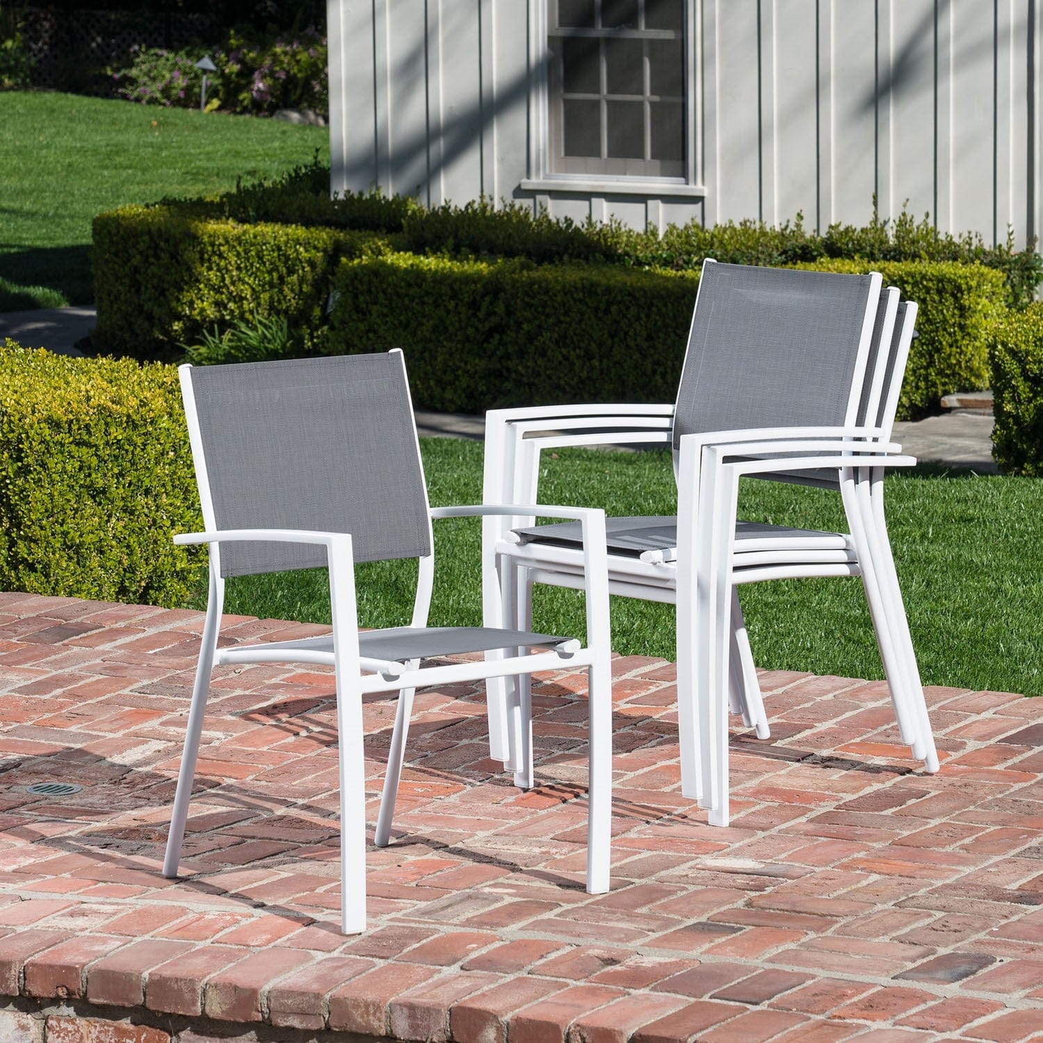 Hanover Outdoor Dining Set Hanover Fresno 9-Piece Outdoor Dining Set with 8 Sling Arm Chairs and a 42" x 83" Glass-Top Table | FRESDN9PC-WHT