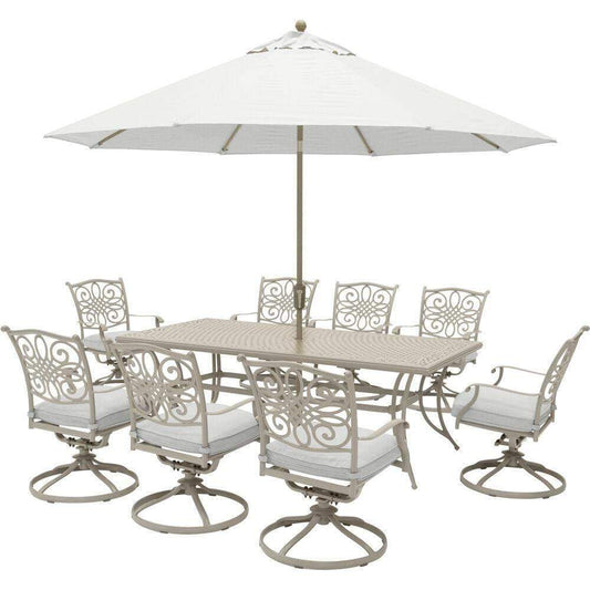 Hanover Outdoor Dining Set Hanover Hanover Traditions 9-Piece Dining Set with 8 Swivel Rockers, Large 84-in. x 42-in. Cast-top Table, 11-Ft. Table Umbrella and Stand - TRADDNSD9PCSW8-BE-SU