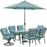 Hanover Outdoor Dining Set Hanover Lavallette 7-Piece Dining Set in Ocean Blue w/ 4 Chairs, 2 Swivel Rockers, 66" x 38" Glass-Top Table, Umbrella, and Base - LAVDN7PCSW2-BLU-SU