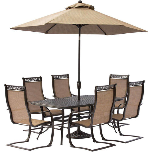 Hanover Outdoor Dining Set Hanover - Manor 7-Piece Dining Set with Six C-Spring Chairs, a 72 x 38 In. Cast-top Dining Table, 9 Ft. Umbrella and Umbrella Stand MANDN7PCSP-SU