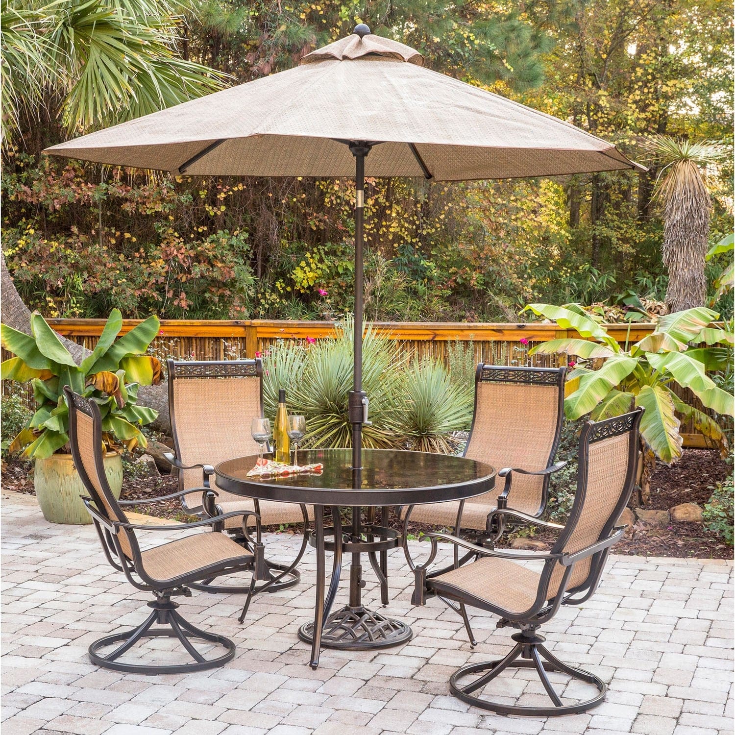 Hanover Outdoor Dining Set Hanover Monaco 5-Piece Dining Set with Swivel Sling Chairs, Glass-top Dining Table, 9 Ft. Table Umbrella, and Umbrella Stand | MONDN5PCSWG-SU