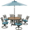 Hanover Outdoor Dining Set Hanover Monaco 7-Piece Dining Set in Blue with Six Swivel Rockers, 60-in. Tile-Top Table and 9-Ft. Umbrella