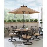 Hanover Outdoor Dining Set Hanover Monaco 7-Piece Dining Set in Tan with Six Swivel Rockers, 60-in. Tile-Top Table and 9-Ft. Umbrella | MONDN7PCSW6RDTLC-SU-T