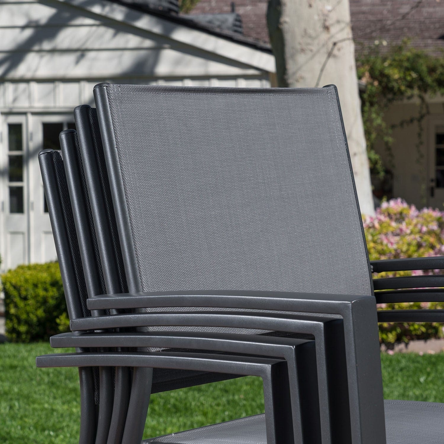 Hanover Outdoor Dining Set Hanover Naples 7-Piece Outdoor Dining Set with 6 Sling Chairs in Gray and a 63" x 35" Dining Table