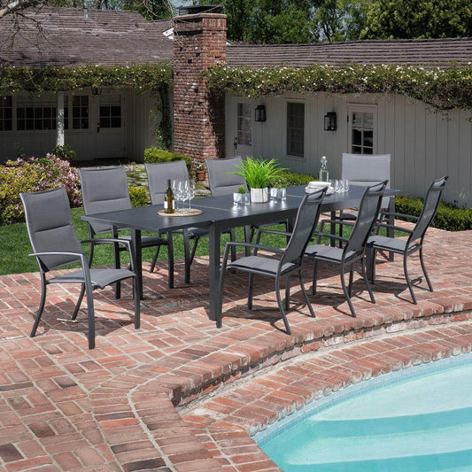Hanover Outdoor Dining Set Hanover - Naples 9-Piece Outdoor Dining Set with 8 Padded Sling Chairs in Gray and a 40" x 118" Expandable Dining Table