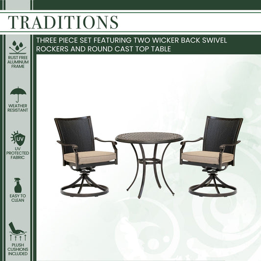 Hanover Outdoor Dining Set Hanover Traditions 3-Piece Dining Set in Tan with 2 Wicker Back Swivel Rockers and 32 in. Round Cast-Top Table - TRADDNWB3PCSWC-TAN