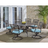 Hanover Outdoor Dining Set Hanover - Traditions 7-Piece Dining Set in Blue with a 60 In. Round Cast-top Table and Six Swivel Rockers - TRADDN7PCSWRD6-BLU
