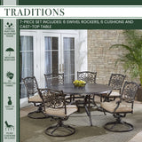 Hanover Outdoor Dining Set Hanover - Traditions 7-Piece Dining Set in Tan with a 60 In. Round Cast-top Table and Six Swivel Rockers - TRADDN7PCSWRD6