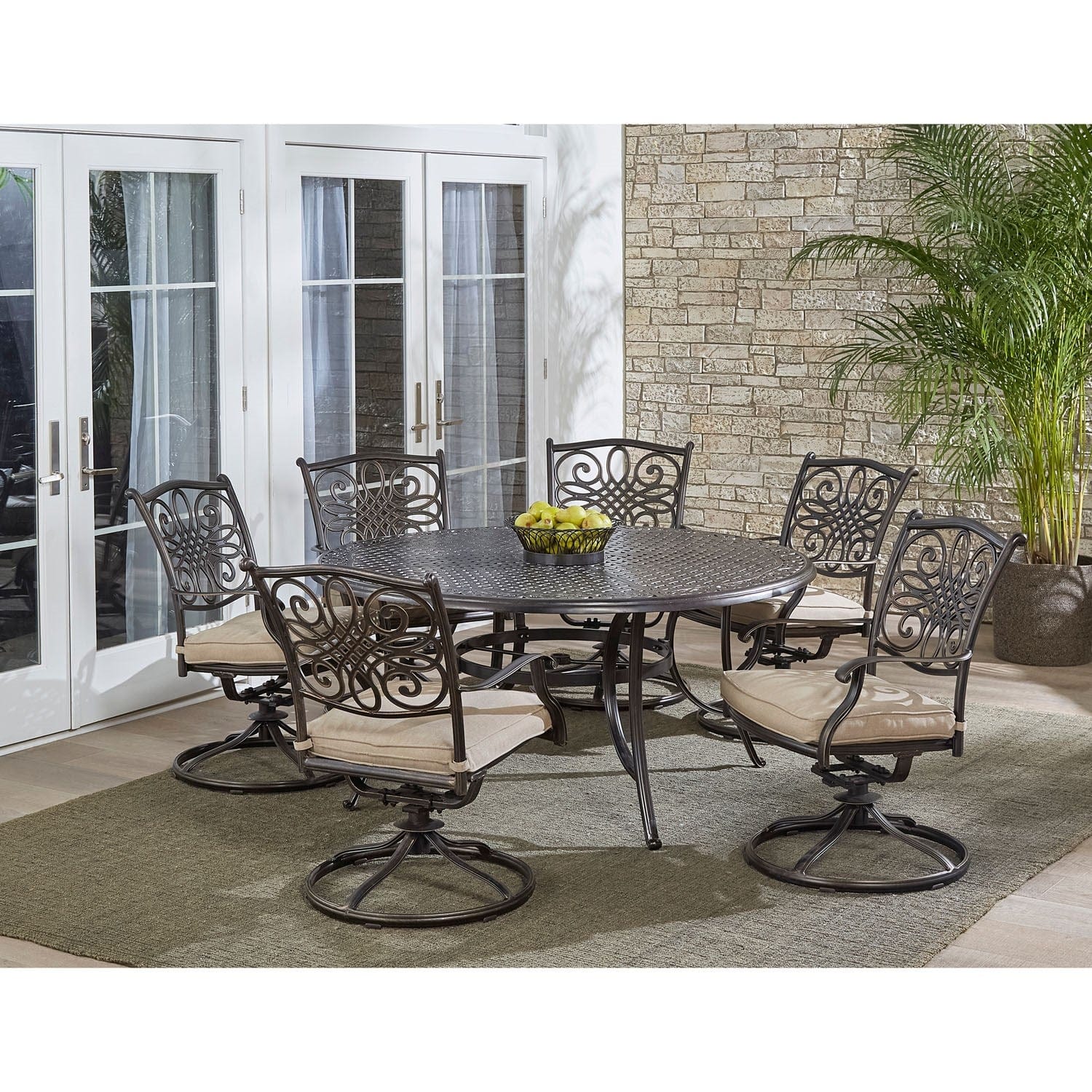 Hanover Outdoor Dining Set Hanover - Traditions 7-Piece Dining Set in Tan with a 60 In. Round Cast-top Table and Six Swivel Rockers - TRADDN7PCSWRD6
