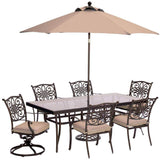 Hanover Outdoor Dining Set Hanover - Traditions 7-Piece Dining Set in Tan with Extra Large Glass-Top Dining Table, 11 Ft. Table Umbrella, and Umbrella Stand TRADDN7PCSW2G-SU