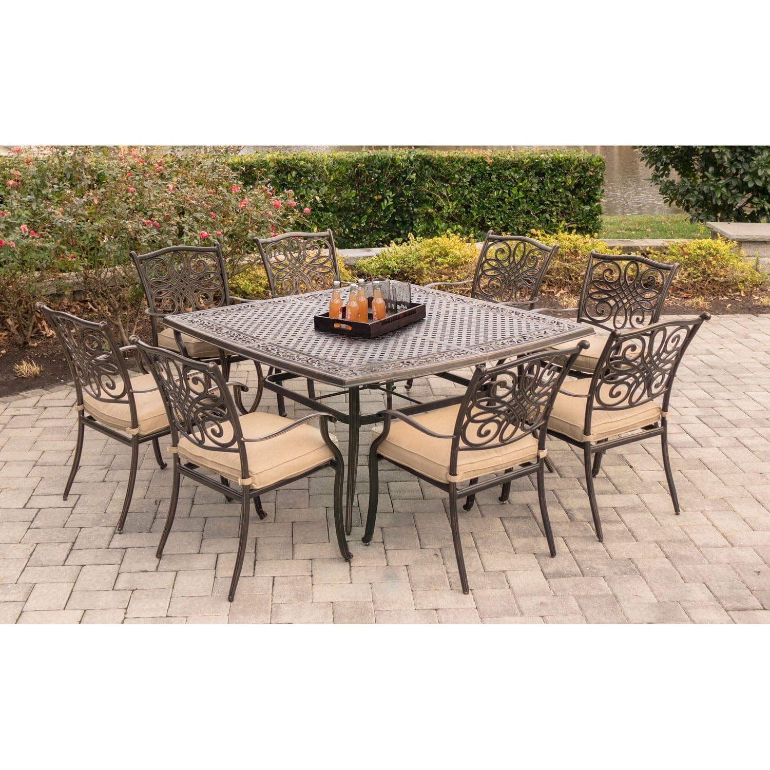 Hanover Outdoor Dining Set Hanover - Traditions 9-Piece Aluminum Frame Square Dining Set in Tan with a Large 60 x 60 in. Cast-top Dining Table | TRADDN9PCSQ