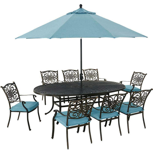 Hanover Outdoor Dining Set Hanover Traditions 9-Piece Dining Set in Blue with 8 Dining Chairs, 95-in. x 60-in. Oval Cast-Top Table, Umbrella and Stand TRADDN9PCOV-SU-B