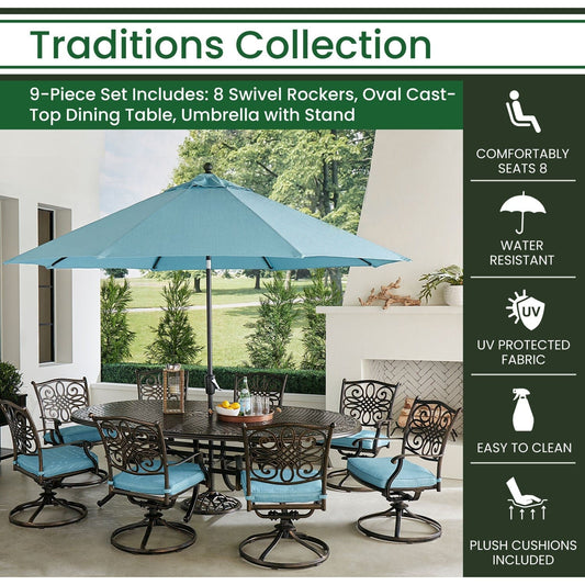Hanover Outdoor Dining Set Hanover Traditions 9-Piece Dining Set in Blue with 8 Swivel Rockers, 95-in. x 60-in. Oval Cast-Top Table, Umbrella and Umbrella Stand