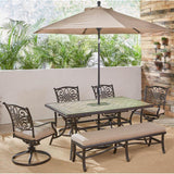 Hanover Table Umbrellas Hanover - Monaco 6-Piece Dining Set in Tan with 4 Swivel Rockers, 1 Bench, a 40" x 68" Tile-Top Table, and a 9 Ft. Umbrella with Stand