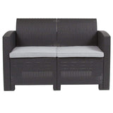 Samuel Norman & Assoc. Furnishings Plastic Rattan Patio Lounge Furniture Samuel Norman & Assoc. Furnishings Dark Gray Rattan Loveseat